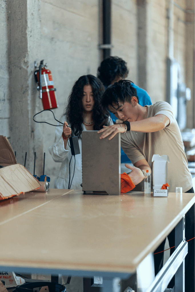 The team plugging in a Core computer